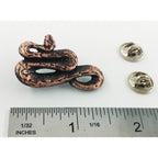 A handcrafted Boa Constrictor Pin next to a ruler, available for sale at Creativeartisan.com - the image offers a sense of scale