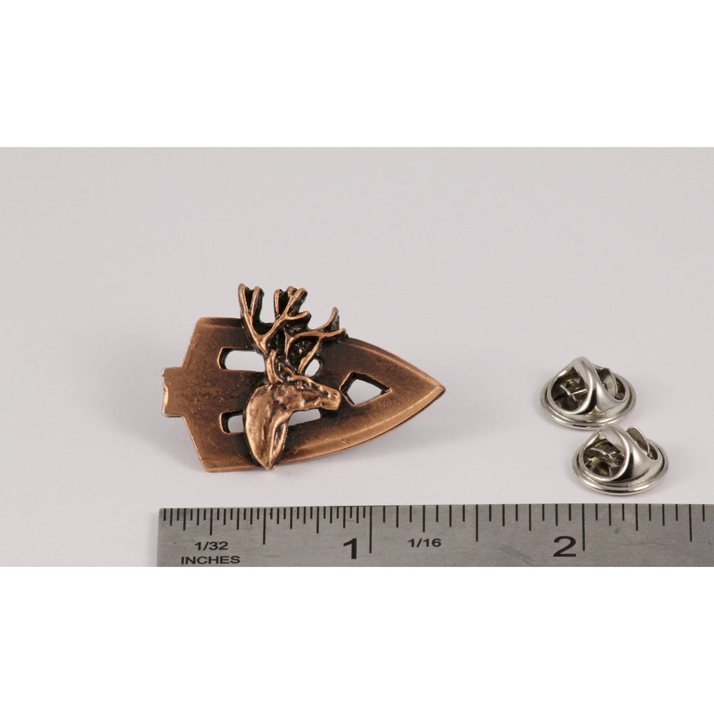 A handcrafted Broadhead With Deer Head Pin next to a ruler, available for sale at Creativeartisan.com - the image offers a sense of scale