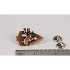 A handcrafted Broadhead With Deer Head Pin next to a ruler, available for sale at Creativeartisan.com - the image offers a sense of scale