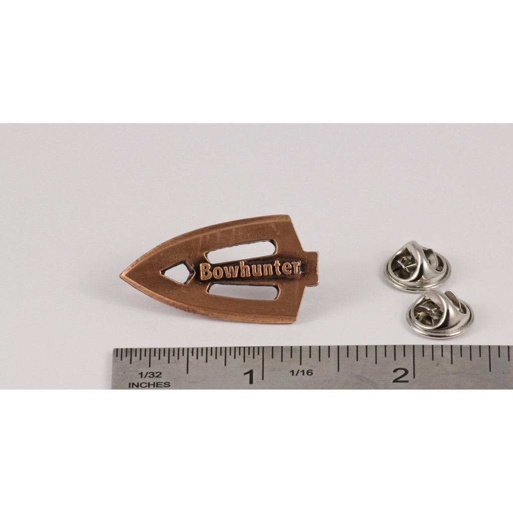 A handcrafted Broadhead Bowhunter Pin next to a ruler, available for sale at Creativeartisan.com - the image offers a sense of scale