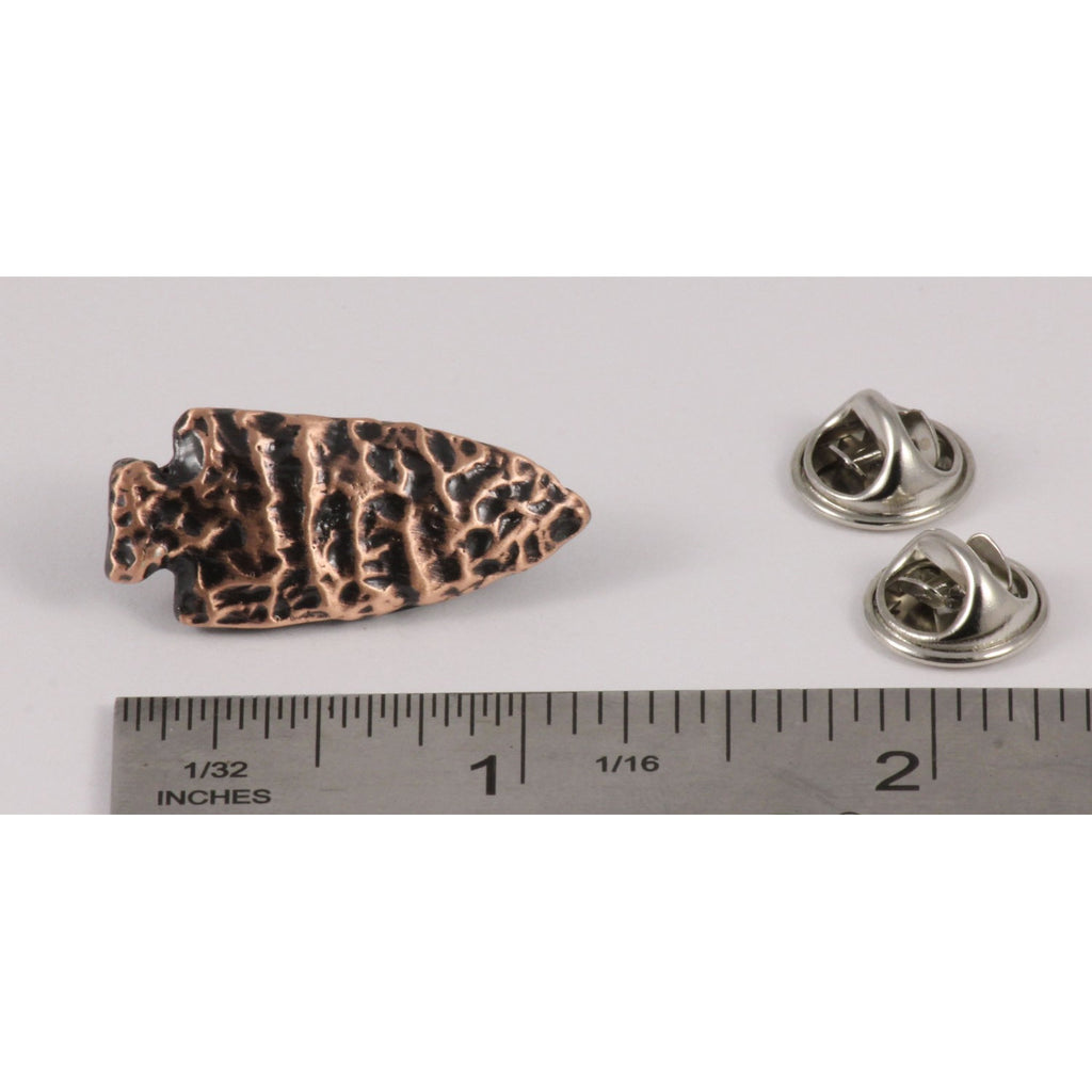 A handcrafted Native American Arrowhead Pin next to a ruler, available for sale at Creativeartisan.com - the image offers a sense of scale