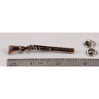 A handcrafted Over Under Shotgun Pin next to a ruler, available for sale at Creativeartisan.com - the image offers a sense of scale