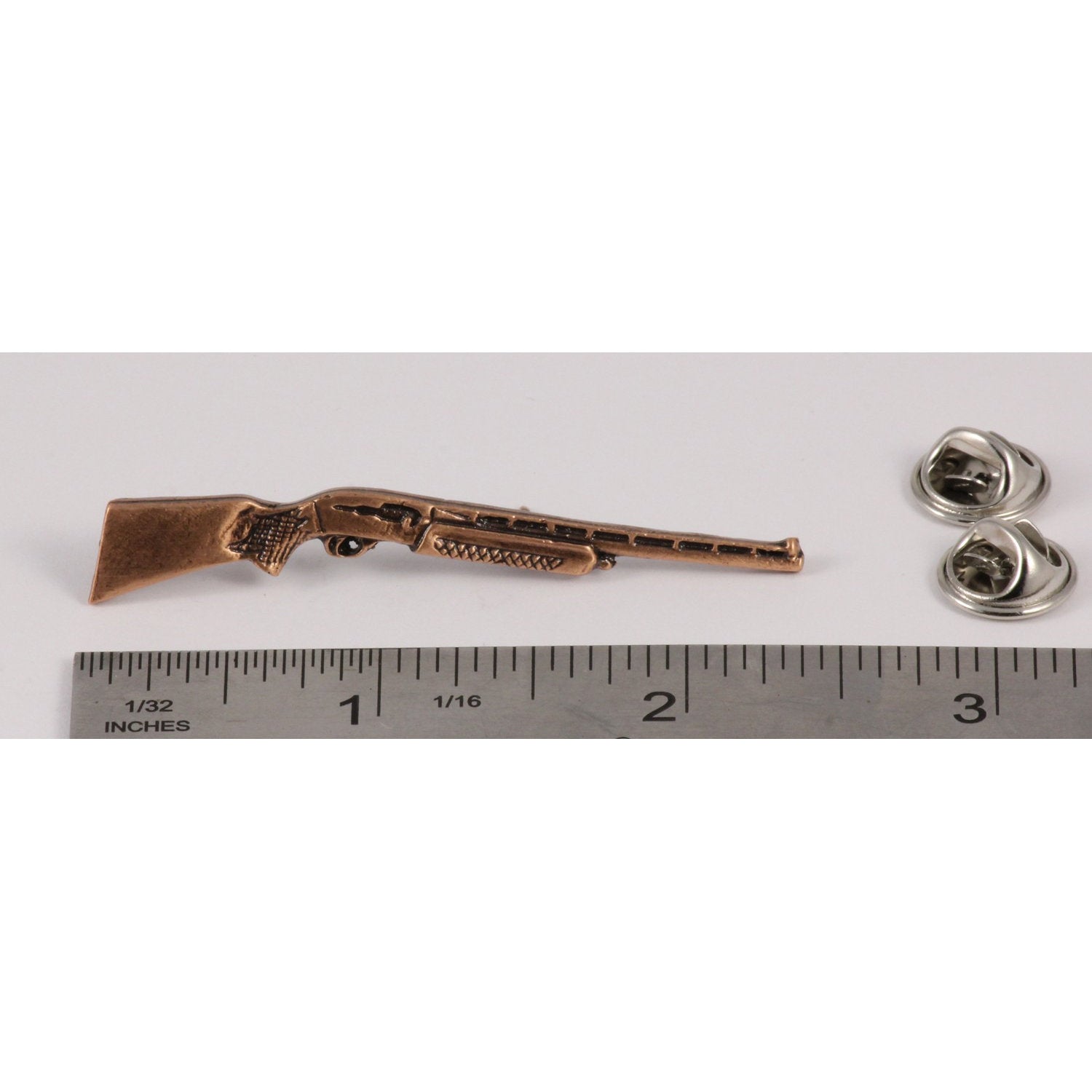 A handcrafted Automatic Shotgun Pin next to a ruler, available for sale at Creativeartisan.com - the image offers a sense of scale