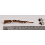 A handcrafted Pump Shotgun Pin next to a ruler, available for sale at Creativeartisan.com - the image offers a sense of scale