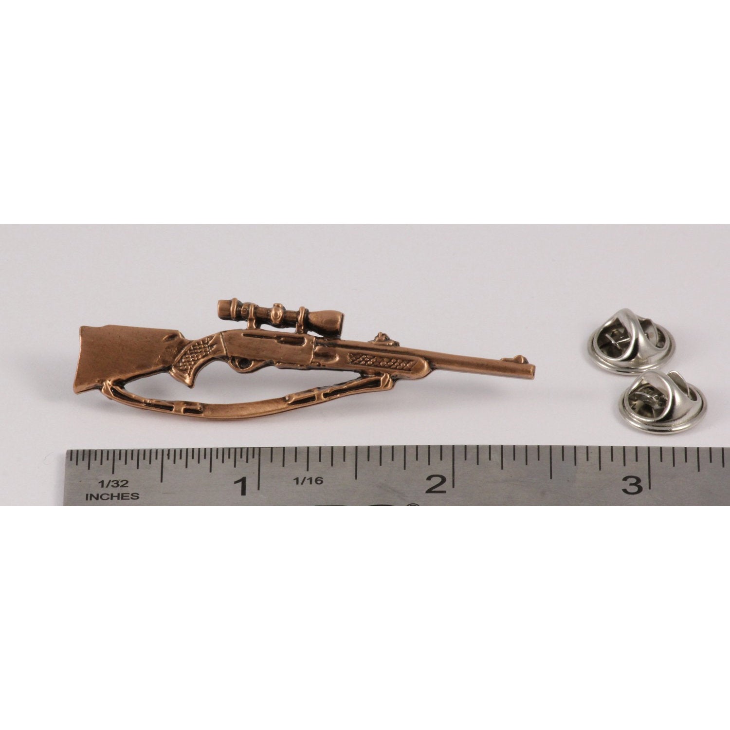 A handcrafted Bolt Action Rifle With Scope Pin next to a ruler, available for sale at Creativeartisan.com - the image offers a sense of scale