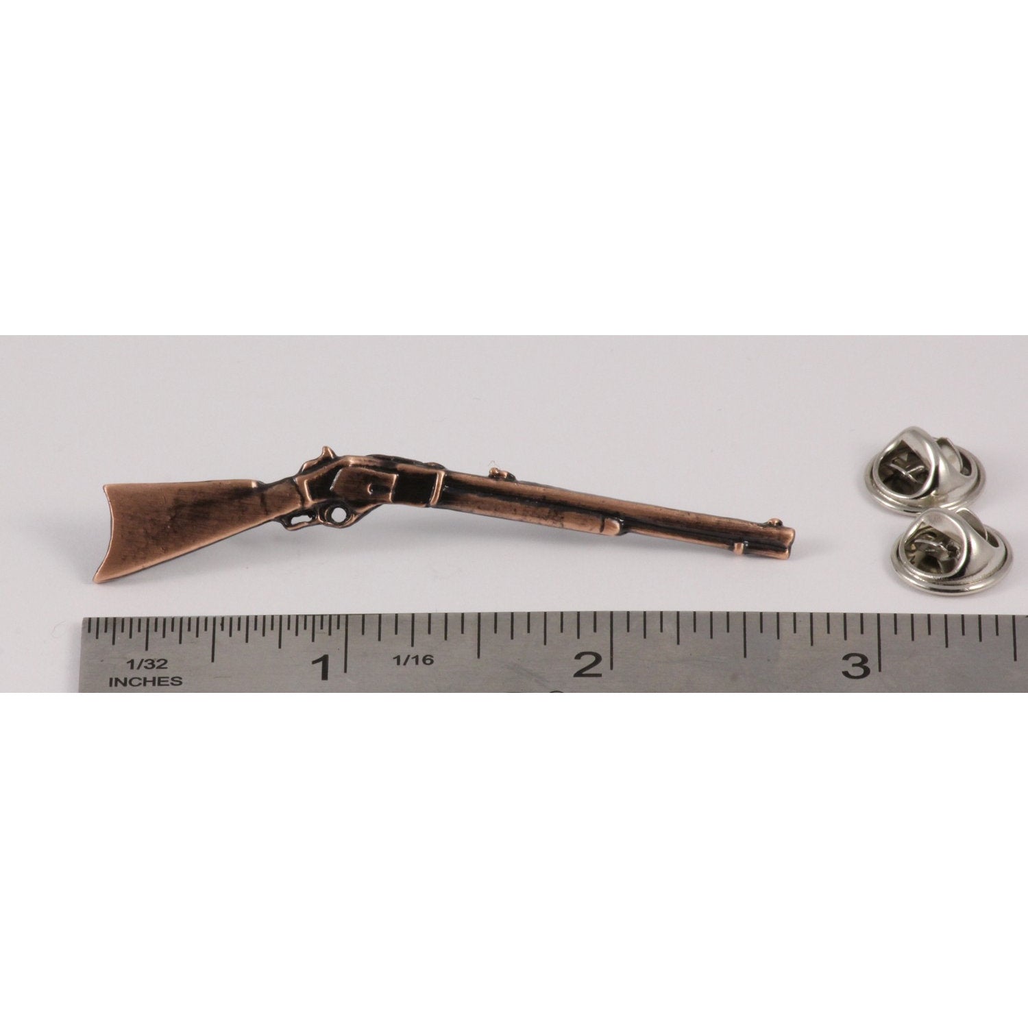 A handcrafted Lever Action Pin next to a ruler, available for sale at Creativeartisan.com - the image offers a sense of scale