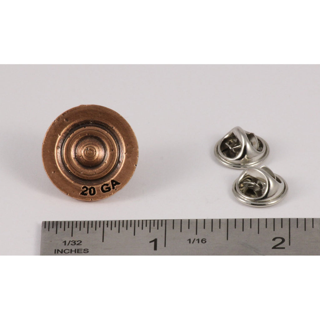 A handcrafted Shotgun Shell Brass 20 Gage Pin next to a ruler, available for sale at Creativeartisan.com - the image offers a sense of scale