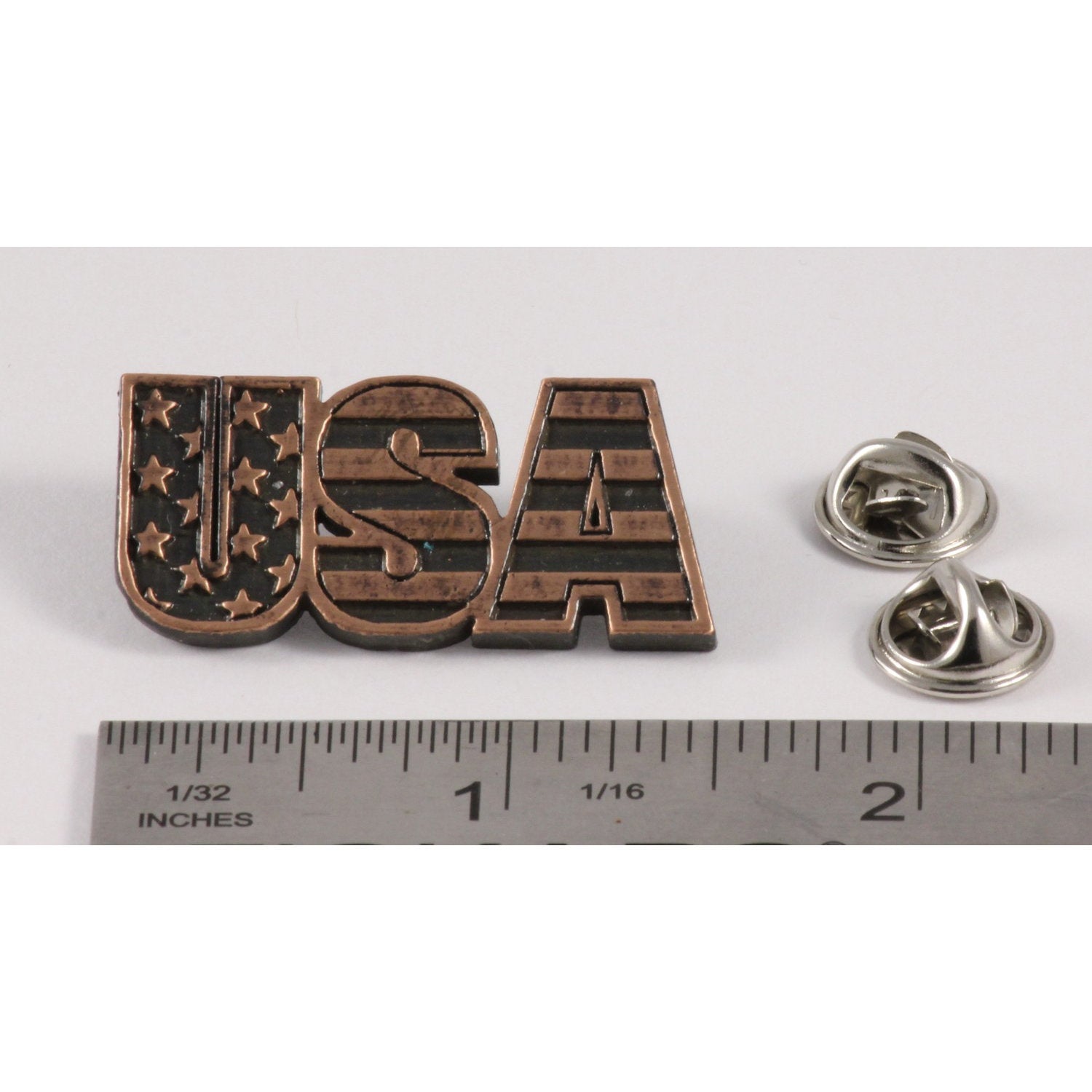 A handcrafted Usa Pin next to a ruler, available for sale at Creativeartisan.com - the image offers a sense of scale