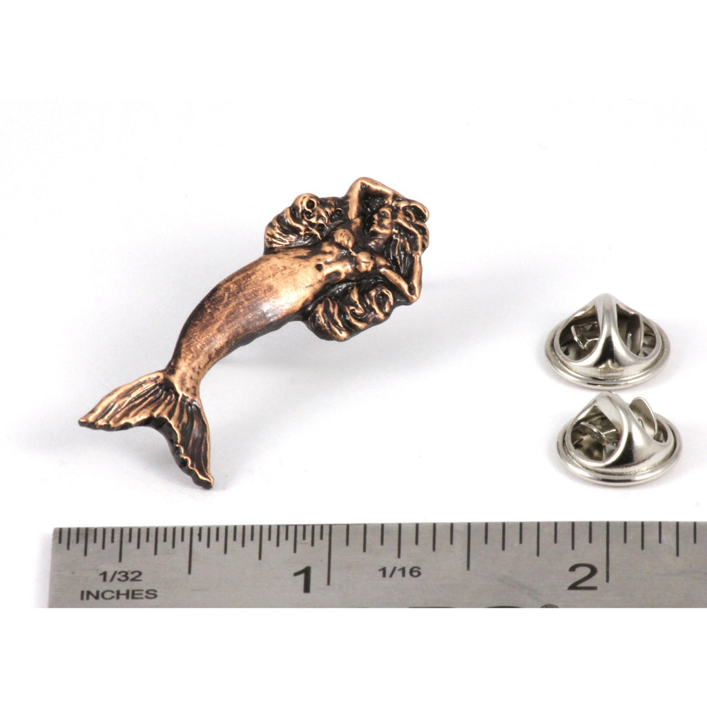 A handcrafted Mermaid Pin next to a ruler, available for sale at Creativeartisan.com - the image offers a sense of scale