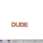 A handcrafted Dude Pin next to a ruler, available for sale at Creativeartisan.com - the image offers a sense of scale