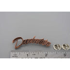 A handcrafted Dudette Pin next to a ruler, available for sale at Creativeartisan.com - the image offers a sense of scale