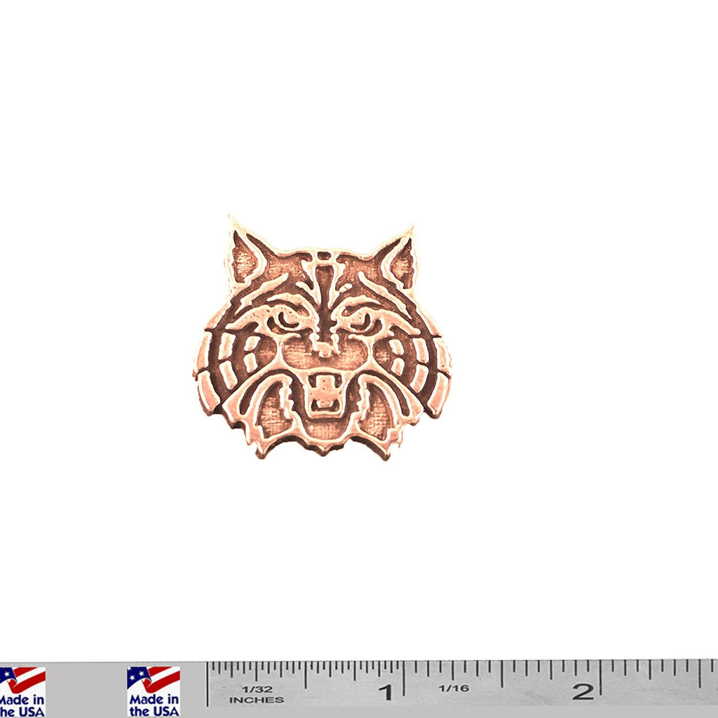 A handcrafted Wildcat Pin next to a ruler, available for sale at Creativeartisan.com - the image offers a sense of scale