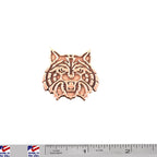 A handcrafted Wildcat Pin next to a ruler, available for sale at Creativeartisan.com - the image offers a sense of scale