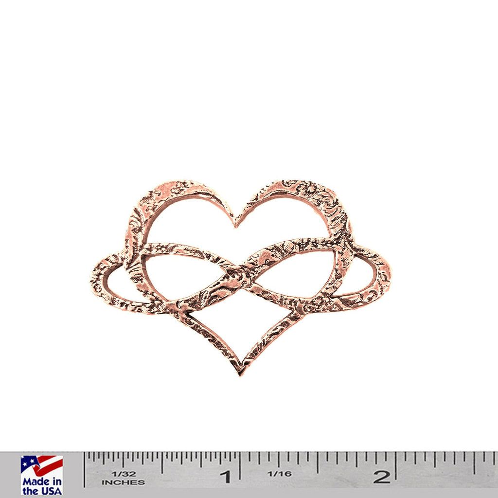 A handcrafted Infinity Heart Pin next to a ruler, available for sale at Creativeartisan.com - the image offers a sense of scale