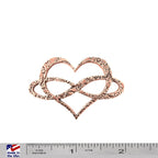 A handcrafted Infinity Heart Pin next to a ruler, available for sale at Creativeartisan.com - the image offers a sense of scale