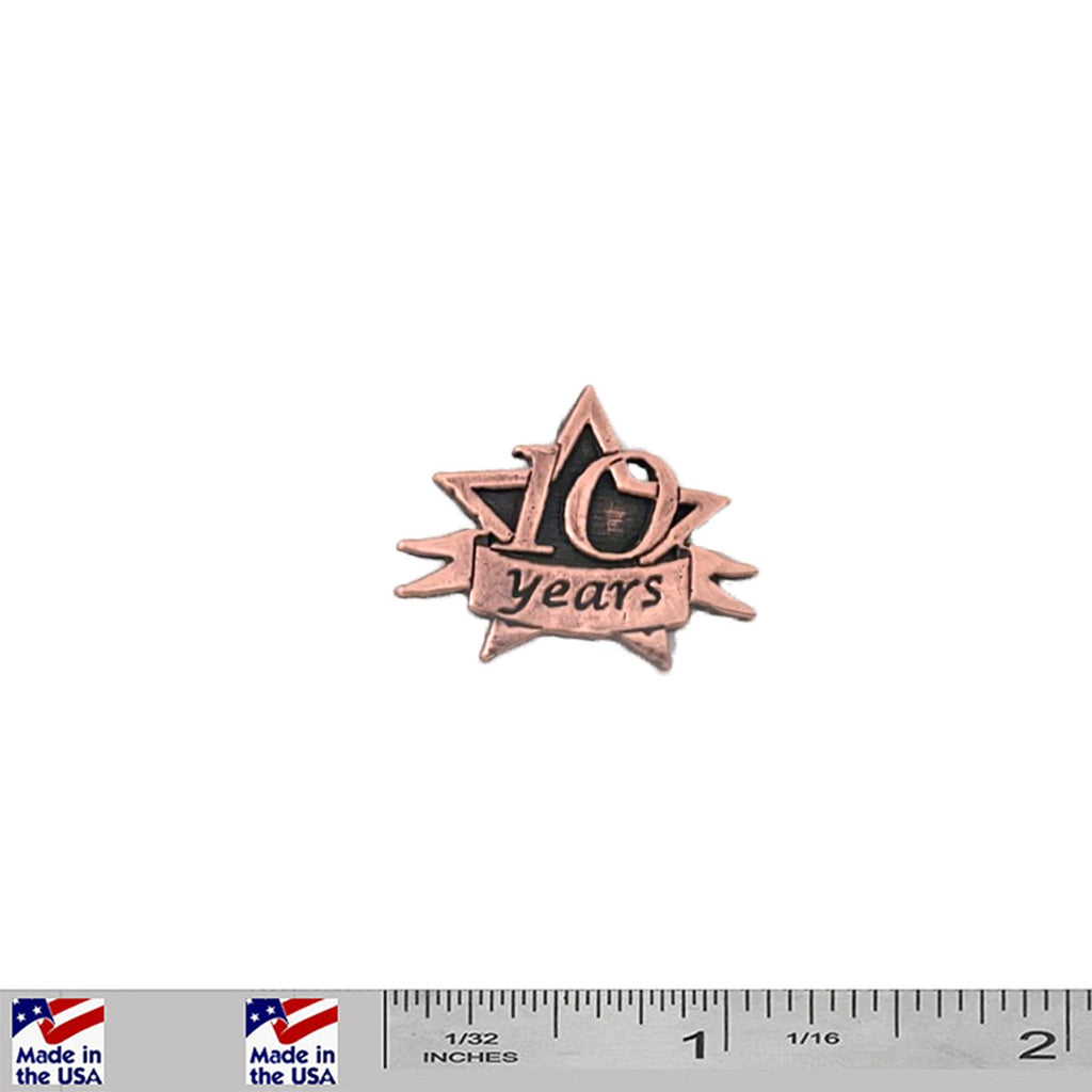 A handcrafted 10 Year Star Pin next to a ruler, available for sale at Creativeartisan.com - the image offers a sense of scale