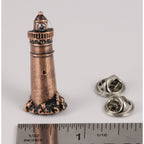 A handcrafted Lighthouse Pin next to a ruler, available for sale at Creativeartisan.com - the image offers a sense of scale