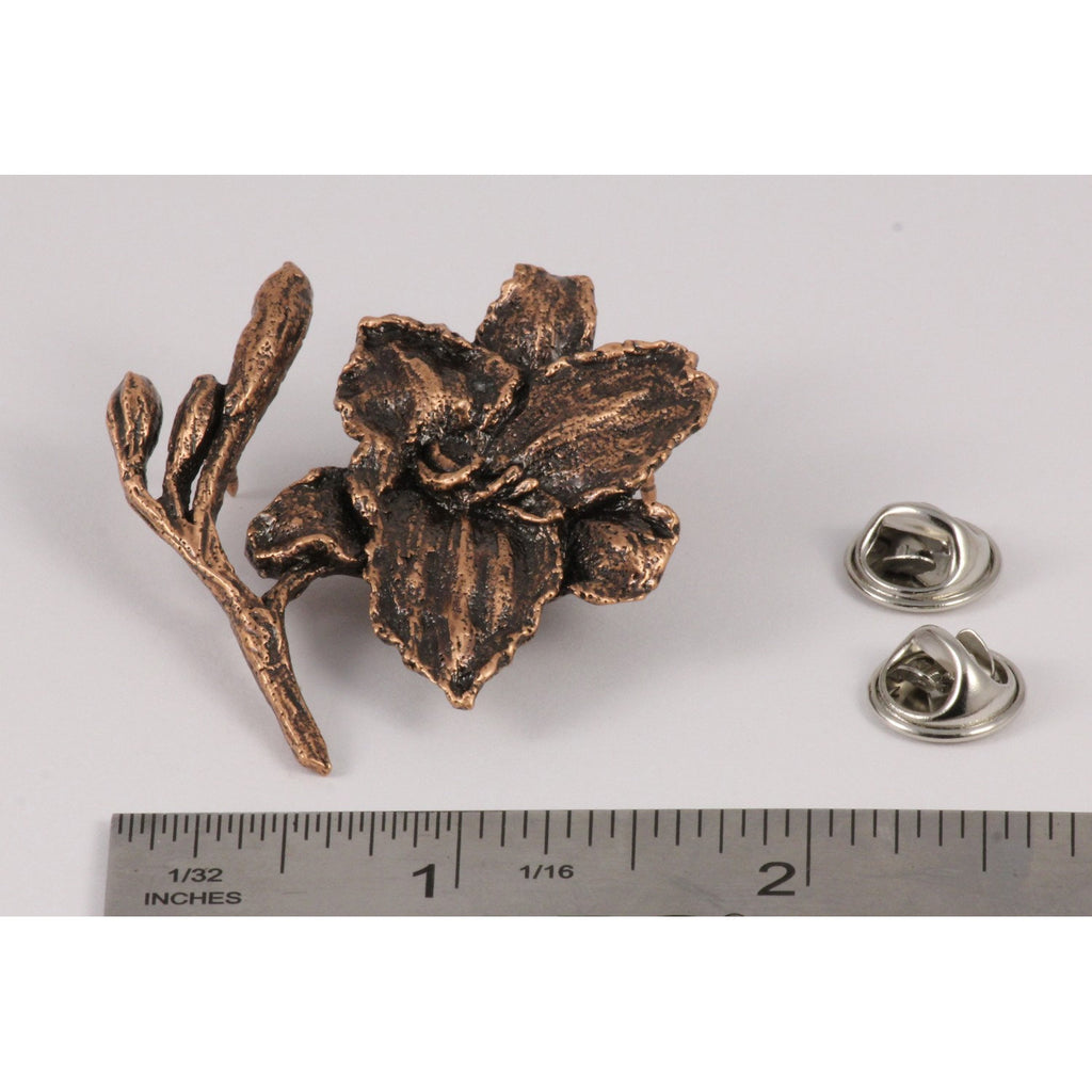 A handcrafted Day Lilly Pin next to a ruler, available for sale at Creativeartisan.com - the image offers a sense of scale