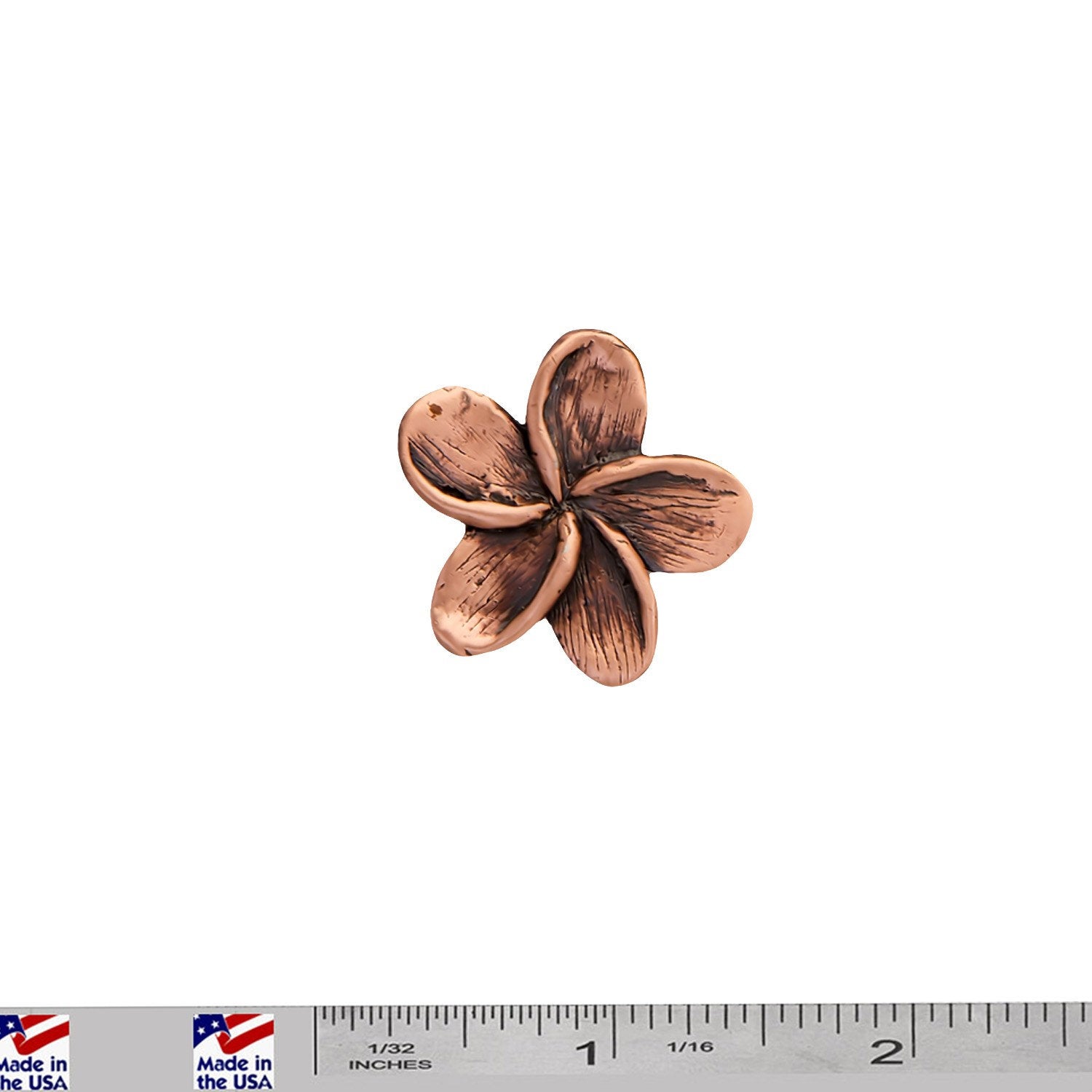A handcrafted Frangipani Flower Pin next to a ruler, available for sale at Creativeartisan.com - the image offers a sense of scale