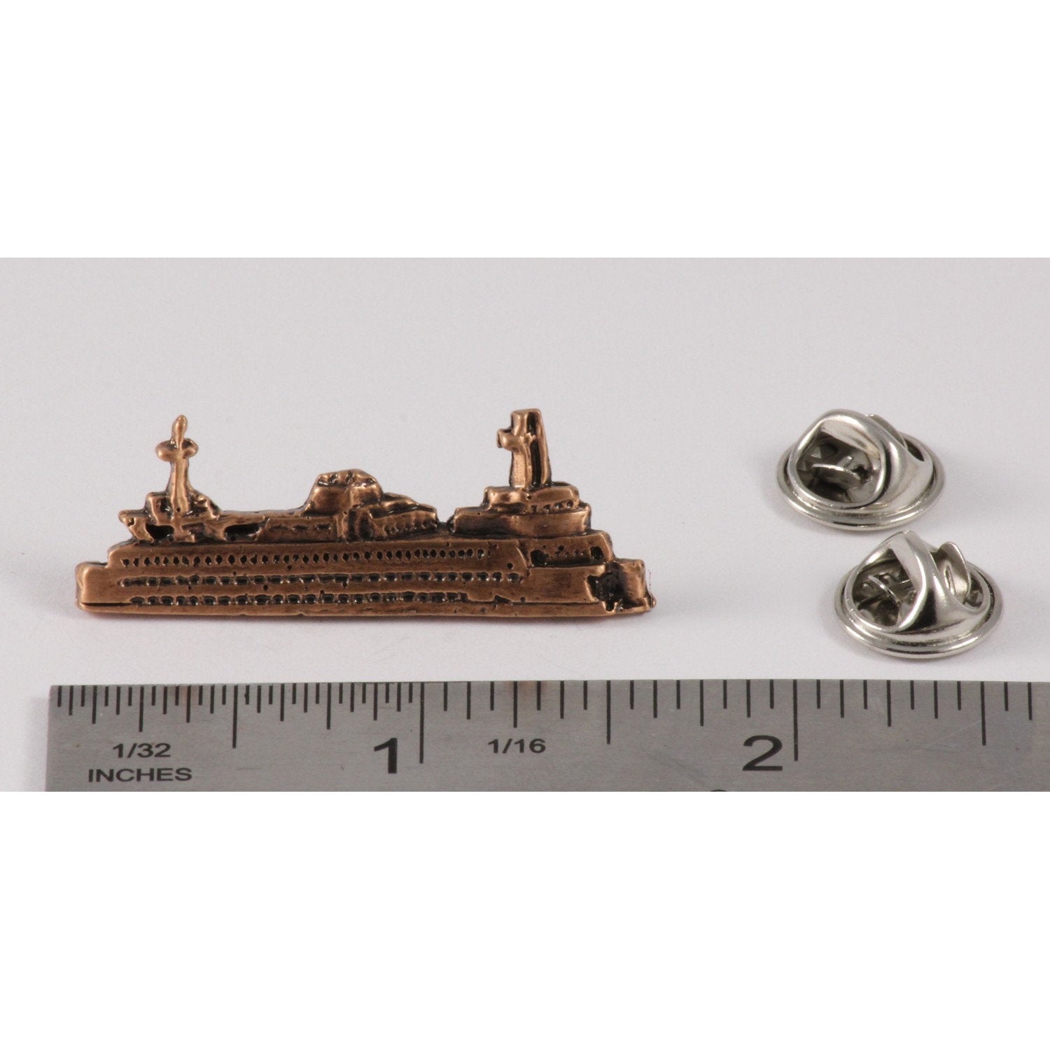 A handcrafted Washington State Ferry Boat Pin next to a ruler, available for sale at Creativeartisan.com - the image offers a sense of scale