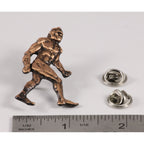A handcrafted Sasquatch Bigfoot Full Body Pin next to a ruler, available for sale at Creativeartisan.com - the image offers a sense of scale