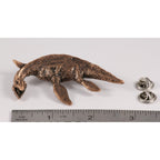 A handcrafted Elasmosaurus Prehistoric Marine Reptile Pin next to a ruler, available for sale at Creativeartisan.com - the image offers a sense of scale