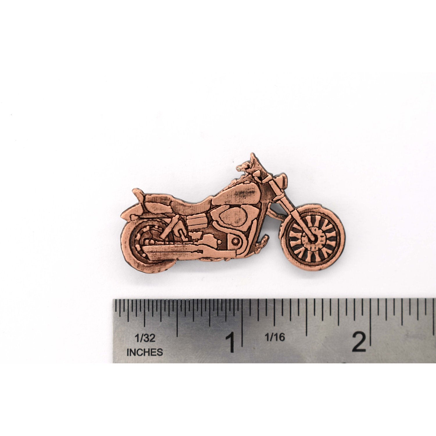 A handcrafted Motorcycle Pin next to a ruler, available for sale at Creativeartisan.com - the image offers a sense of scale