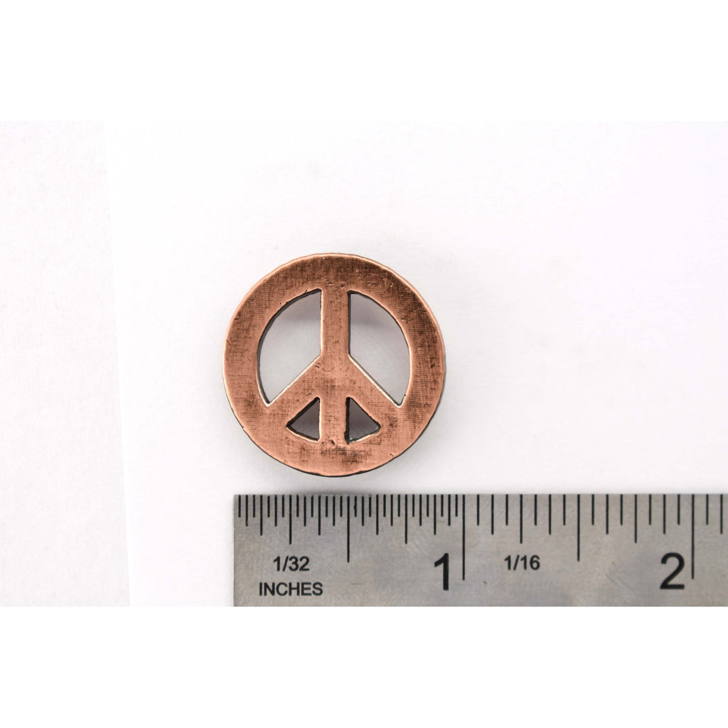 A handcrafted Peace Sign Plain Pin next to a ruler, available for sale at Creativeartisan.com - the image offers a sense of scale