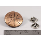 A handcrafted Basketball Pin next to a ruler, available for sale at Creativeartisan.com - the image offers a sense of scale