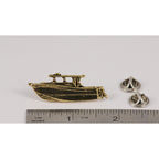 A handcrafted Power Boat Pin next to a ruler, available for sale at Creativeartisan.com - the image offers a sense of scale