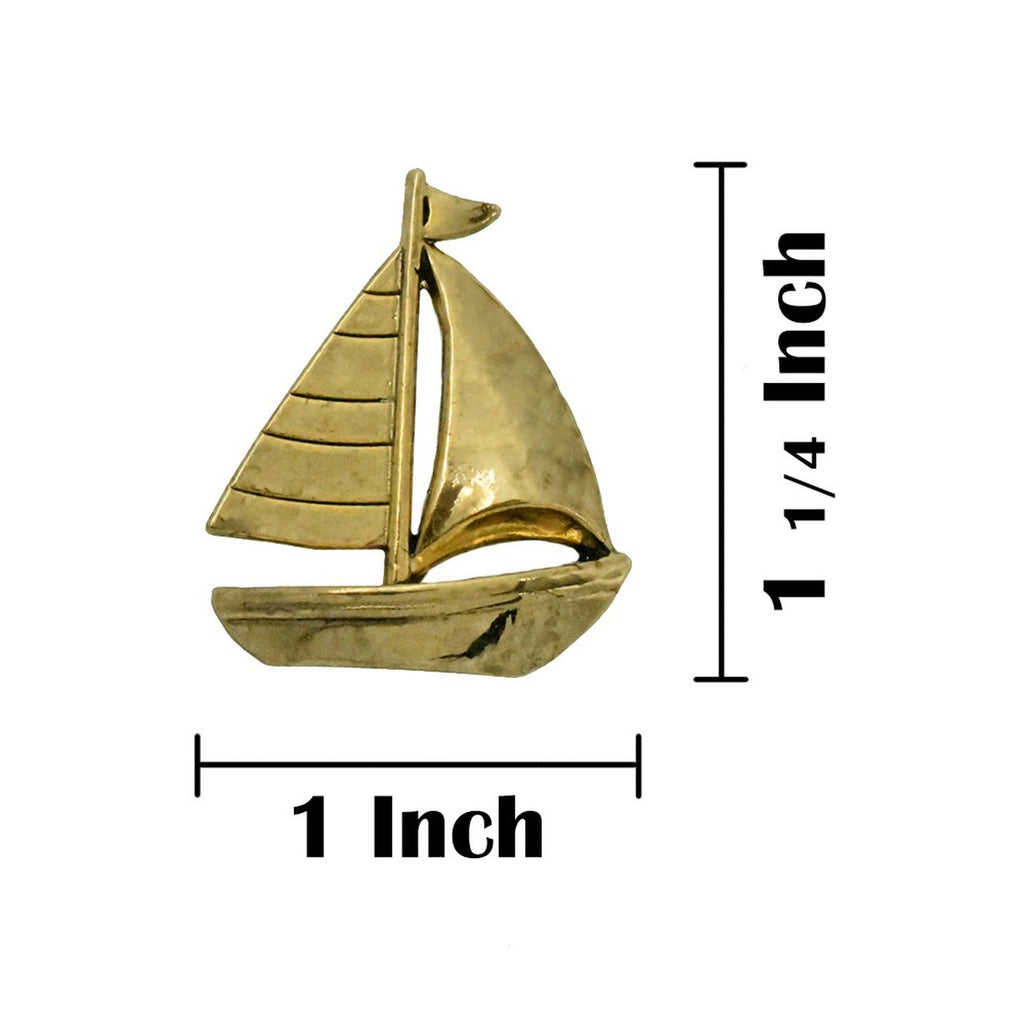 A handcrafted Sailboat Pin next to a ruler, available for sale at Creativeartisan.com - the image offers a sense of scale