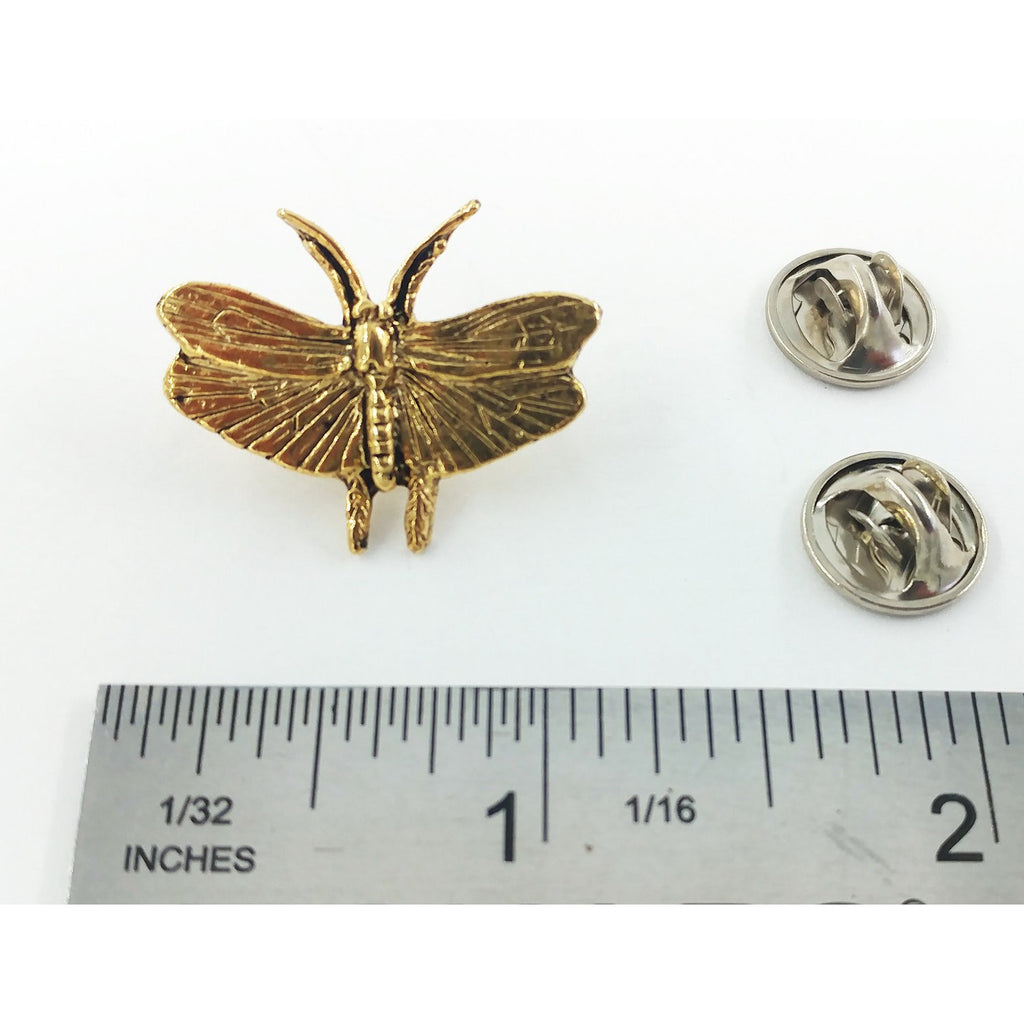 A handcrafted Moth Pin next to a ruler, available for sale at Creativeartisan.com - the image offers a sense of scale