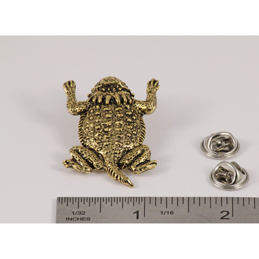 A handcrafted Horny Toad Short Horned Lizard Pin next to a ruler, available for sale at Creativeartisan.com - the image offers a sense of scale