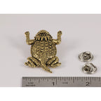 A handcrafted Horny Toad Short Horned Lizard Pin next to a ruler, available for sale at Creativeartisan.com - the image offers a sense of scale