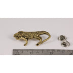 A handcrafted Iguana Pin next to a ruler, available for sale at Creativeartisan.com - the image offers a sense of scale