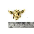 A handcrafted Bumble Bee Top View Pin next to a ruler, available for sale at Creativeartisan.com - the image offers a sense of scale