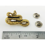 A handcrafted Boa Constrictor Pin next to a ruler, available for sale at Creativeartisan.com - the image offers a sense of scale