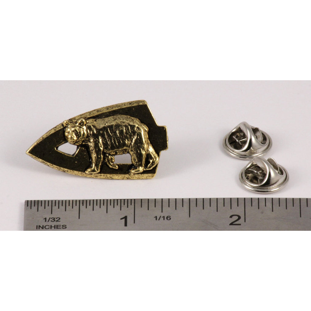 A handcrafted Broadhead With Black Bear Pin next to a ruler, available for sale at Creativeartisan.com - the image offers a sense of scale