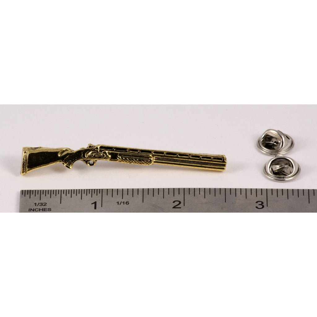 A handcrafted Over Under Shotgun Pin next to a ruler, available for sale at Creativeartisan.com - the image offers a sense of scale