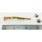 A handcrafted Pump Shotgun Pin next to a ruler, available for sale at Creativeartisan.com - the image offers a sense of scale