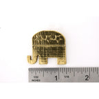 A handcrafted Republic Elephant Pin next to a ruler, available for sale at Creativeartisan.com - the image offers a sense of scale