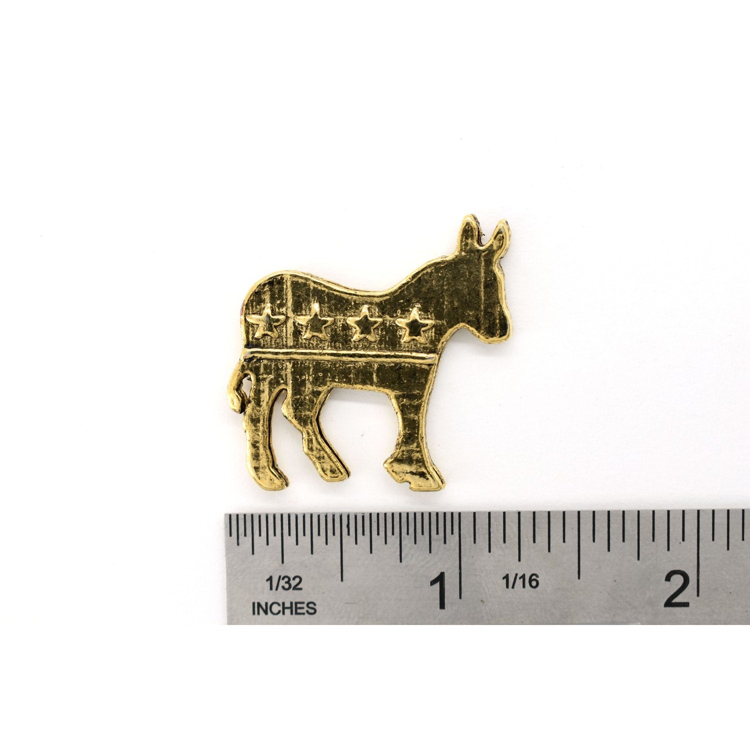 A handcrafted Democrat Monkey Pin next to a ruler, available for sale at Creativeartisan.com - the image offers a sense of scale