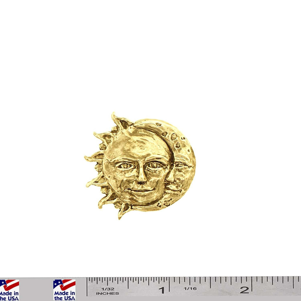 A handcrafted Sun And Moon Pin next to a ruler, available for sale at Creativeartisan.com - the image offers a sense of scale