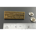 A handcrafted Tall Trees Pin next to a ruler, available for sale at Creativeartisan.com - the image offers a sense of scale
