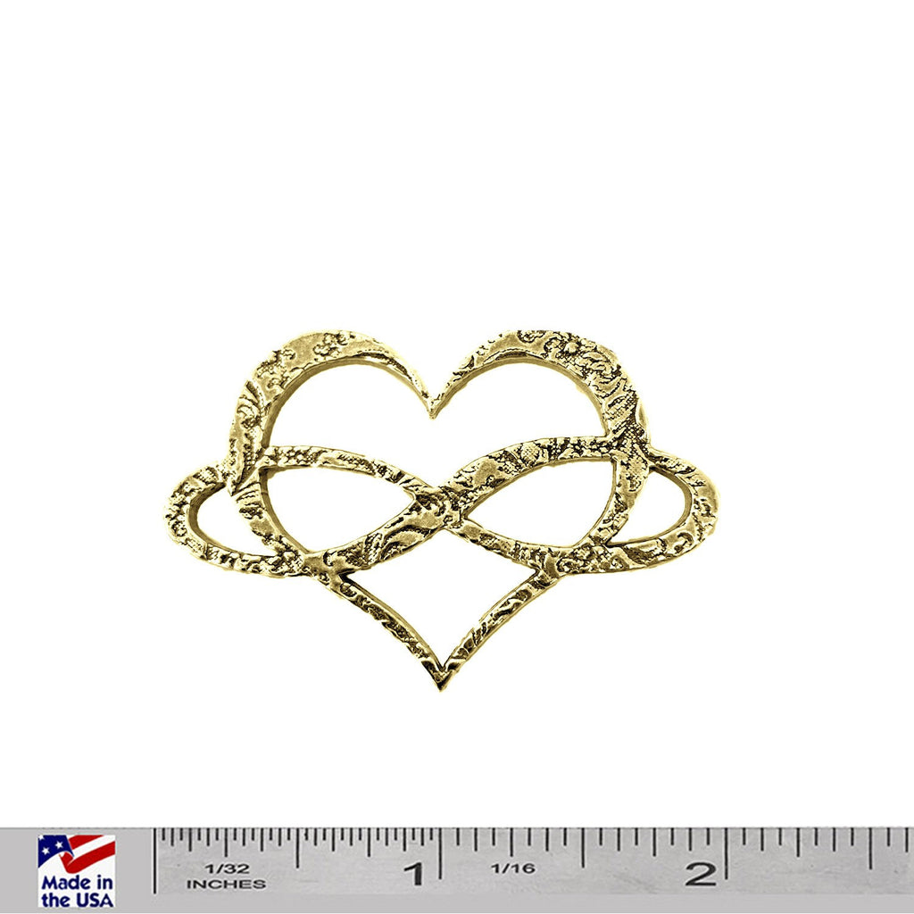 A handcrafted Infinity Heart Pin next to a ruler, available for sale at Creativeartisan.com - the image offers a sense of scale