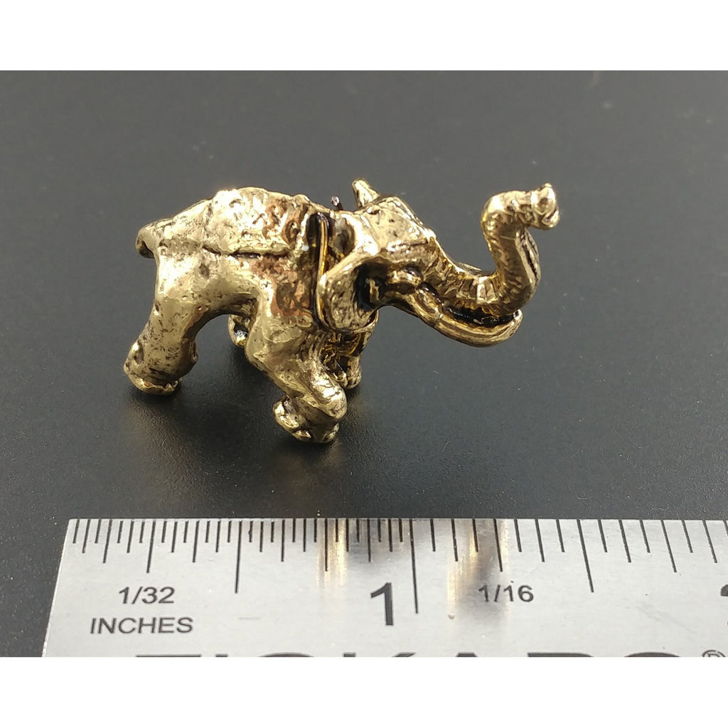 A handcrafted Elephant 3D Pin next to a ruler, available for sale at Creativeartisan.com - the image offers a sense of scale