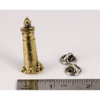 A handcrafted Lighthouse Pin next to a ruler, available for sale at Creativeartisan.com - the image offers a sense of scale