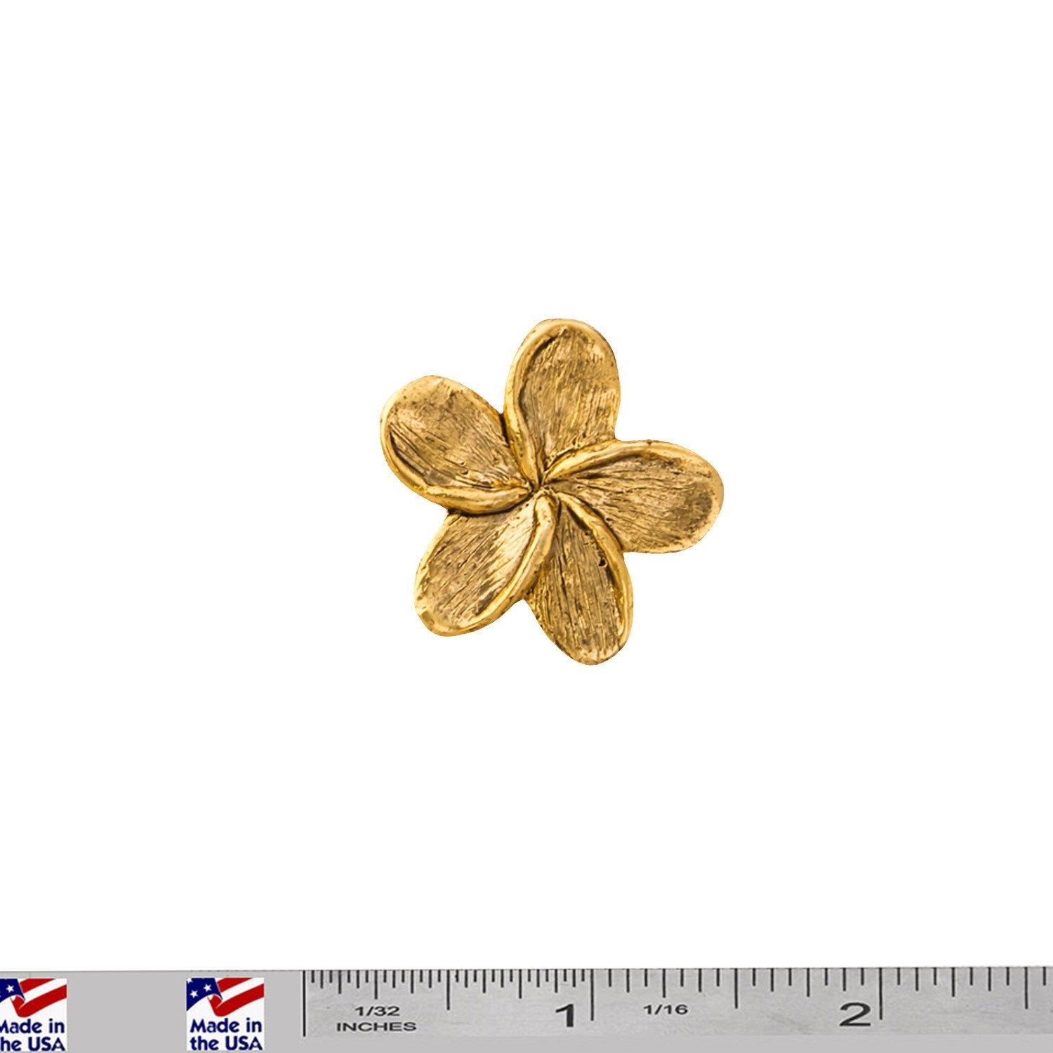 A handcrafted Frangipani Flower Pin next to a ruler, available for sale at Creativeartisan.com - the image offers a sense of scale
