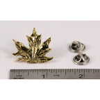 A handcrafted Maple Leaf Pin next to a ruler, available for sale at Creativeartisan.com - the image offers a sense of scale