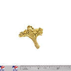 A handcrafted Chanterelle Mushroom Pin next to a ruler, available for sale at Creativeartisan.com - the image offers a sense of scale